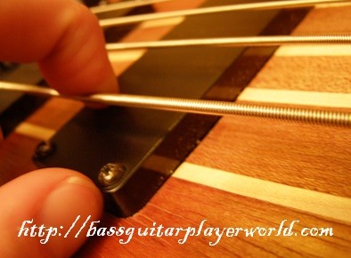 blurred g fingers on bass